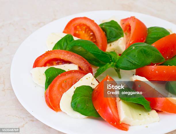 Caprese Salad Stock Photo - Download Image Now - Appetizer, Backgrounds, Basil