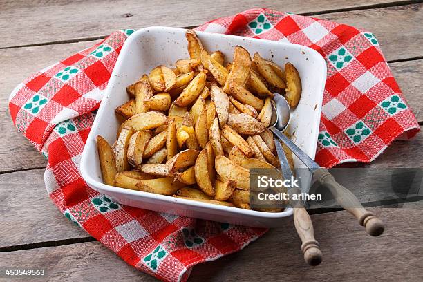 Fried Potatoes Stock Photo - Download Image Now - Oven, Raw Potato, Tin