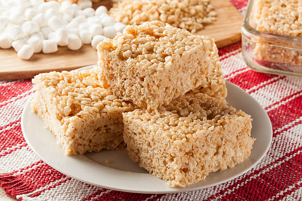 Marshmallow Crispy Rice Treat Homemade Marshmallow Crispy Rice Treat in bar form crunchy photos stock pictures, royalty-free photos & images