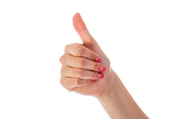 istock Female hand showing thumb up isolated over white 453551497