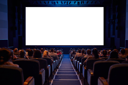 Empty cinema screen with audience.