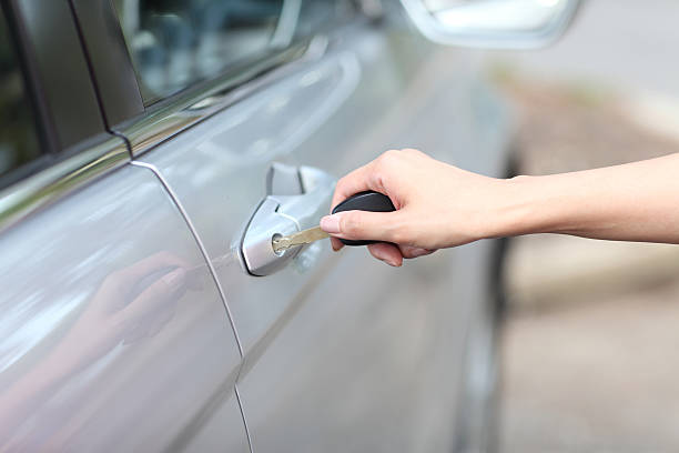 istock Woman hand opening car door, close up 453556607