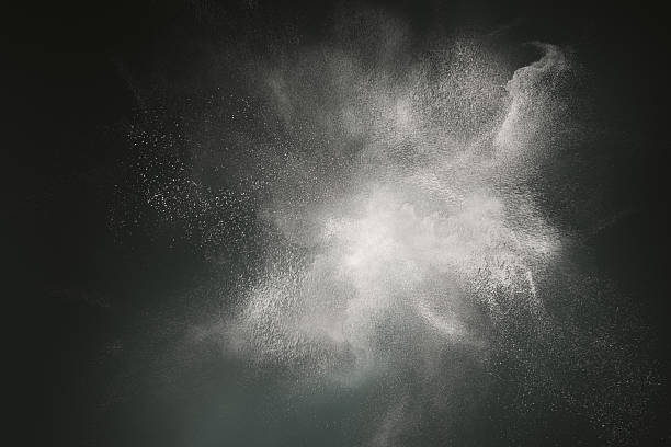 Abstract dust cloud design Abstract design of white powder cloud against dark background big bang stock pictures, royalty-free photos & images