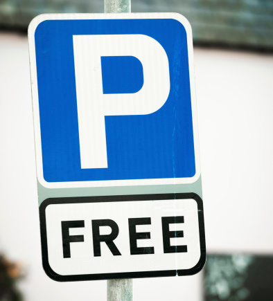 A sign for a free public car park.