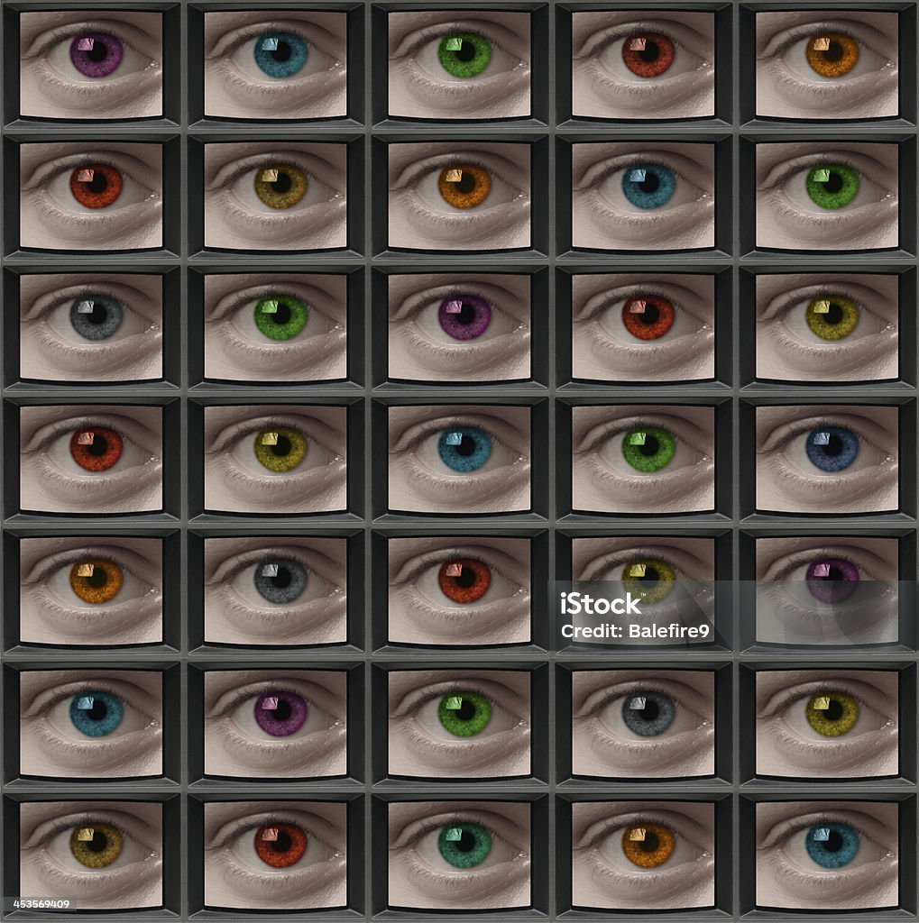 Video monitor screens of eyes with different color pupils Video screens with close-ups of eyes with different color pupils Broadcasting Stock Photo