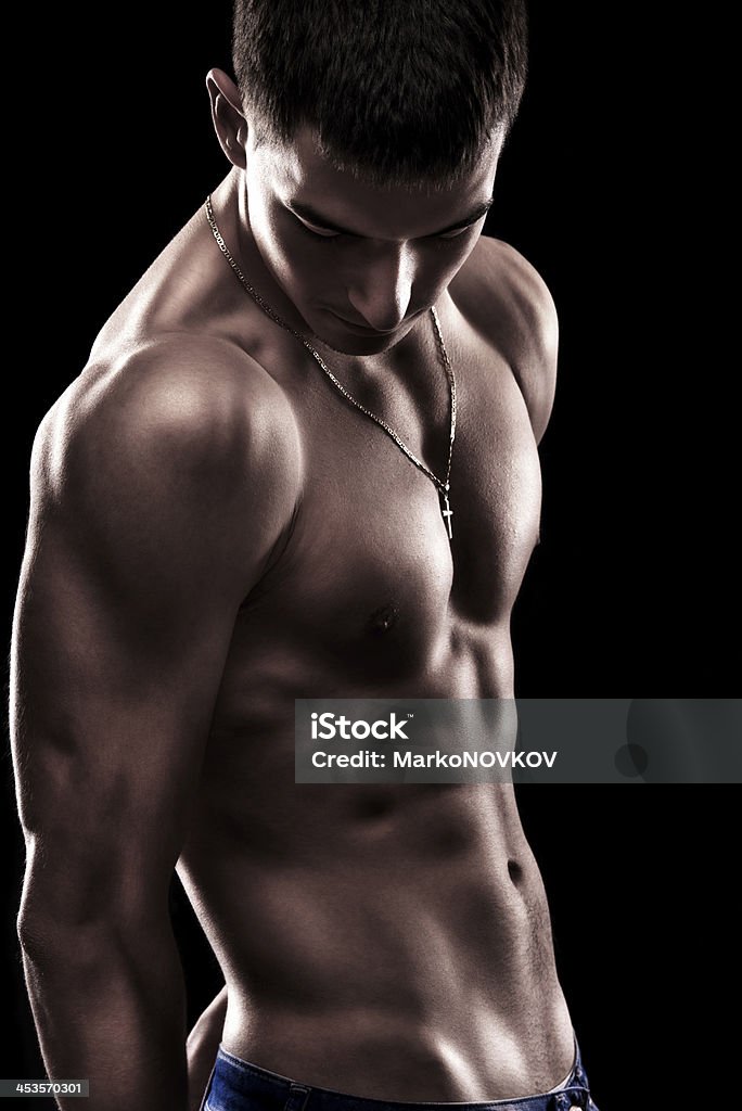 Sexy male upper muscular body Well defined male upper body. Abdominal Muscle Stock Photo