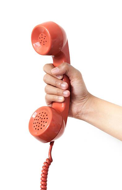 istock vintage orange telephone handset over white background 453570501