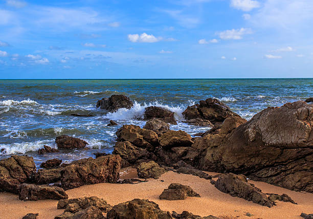 istock ocean waves crashing onto the rocky shore 453571239