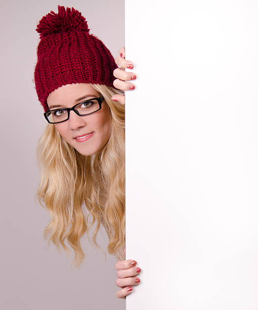 istock Winter woman with blank paper. 453578411