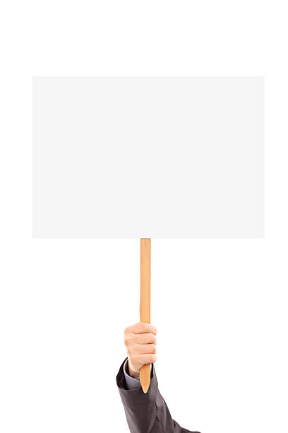 istock Male hand in suit holding a blank panel 453580175