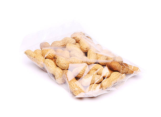 istock plastic bag of peanuts on the white background 453587713