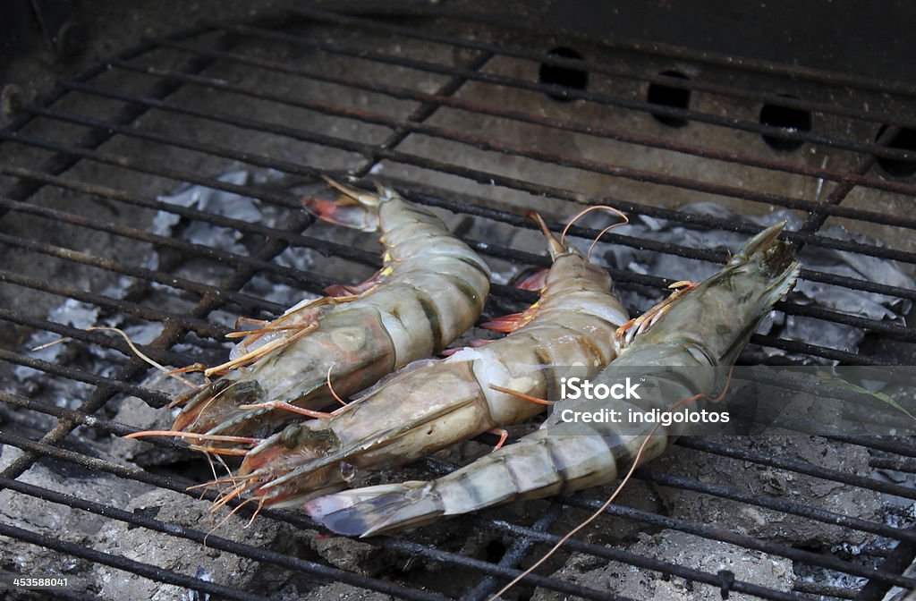 Cooking tiger prawns grilled. Cooking tiger prawns grilled. Close-up. Background. Outdoor. Cooked Stock Photo