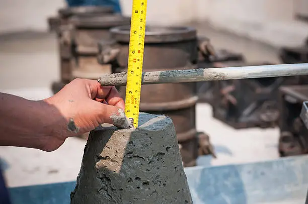 Photo of Concrete slump test before pouring a foundation