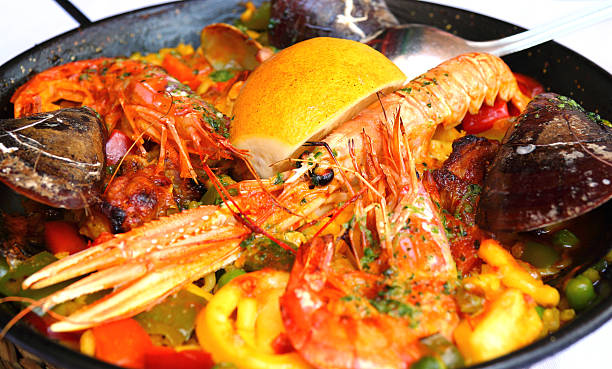 istock Spanish paella with seafood in a pan 453595227