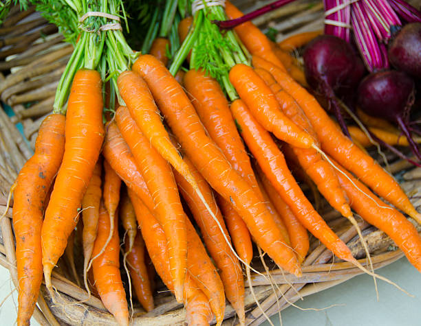 istock Raw Carrots at Farmers Market 453595417