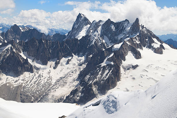 Grandes Jorasses and Dent du Geant Grandes Jorasses and Dent du Geant mountains in the Mount Blanc massif, French Alps. dent du geant stock pictures, royalty-free photos & images