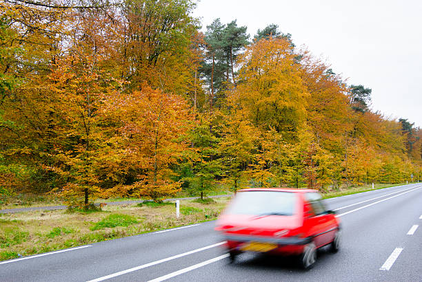 istock Car driving on country road. 453602831