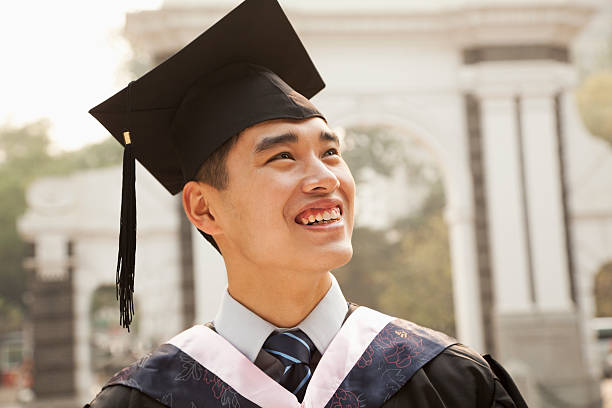 istock Young Graduate in Cap and Gown 453603079