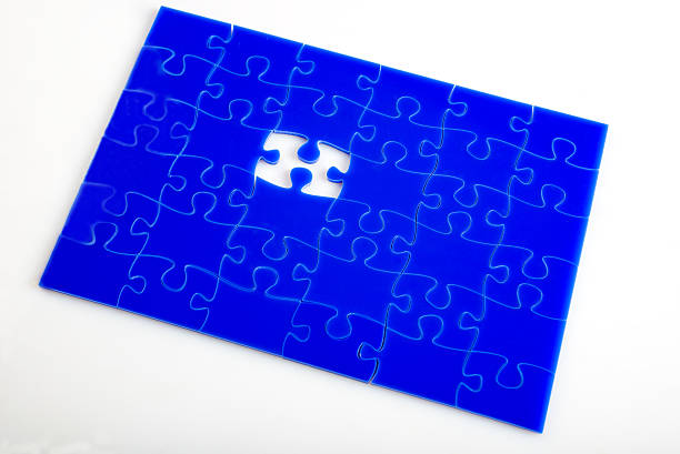 rompecabezas faltante - portion blue jigsaw puzzle puzzle fotografías e imágenes de stock