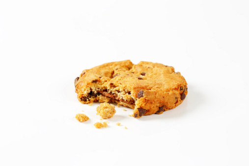 broken chocolate chip cookie isolated on white background