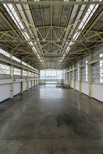 istock Newly constructed empty warehouse/factory from above 453610835