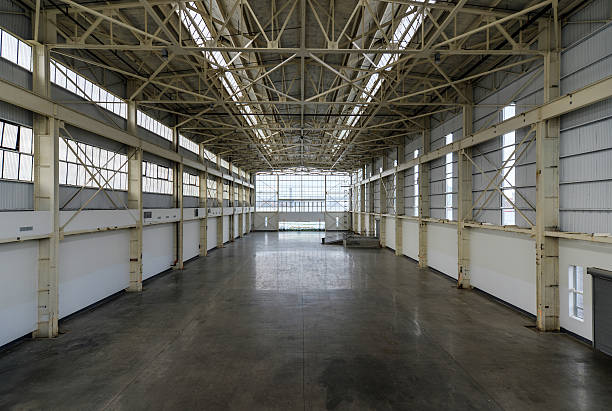 istock Newly constructed empty warehouse/factory from above 453610873