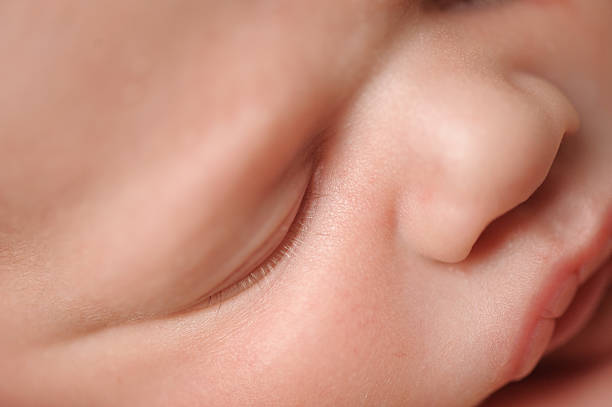 istock Micro Image of Newborn Baby's Face 453613297