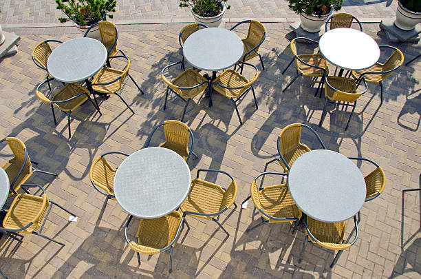 istock street cafe tables and chairs on pavement 453616473