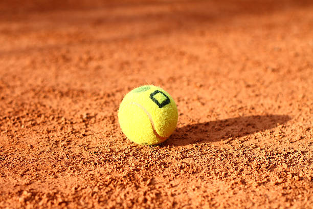 istock Tennis ball is lying on field close-up 453616617