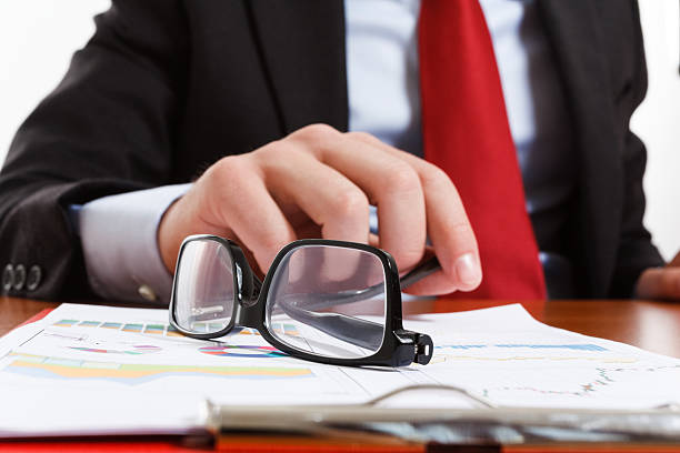 istock Businessman laying down his eyeglasses 453619037