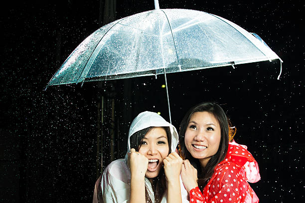 istock Asian women under the rain 453627509