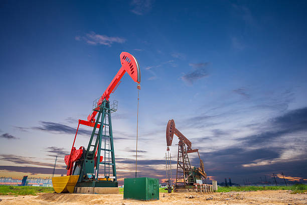 oil pumps oil pumps oil pump petroleum equipment development stock pictures, royalty-free photos & images