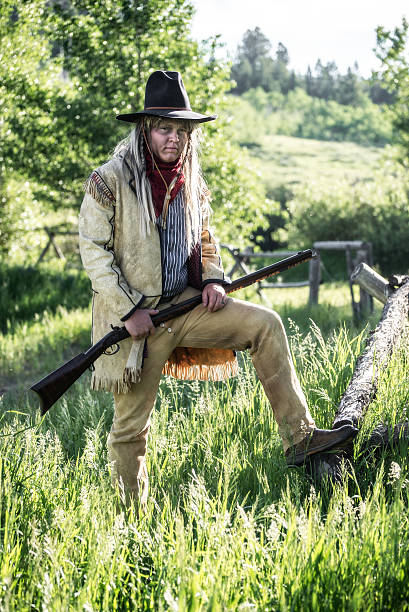istock Historical Man with Shot Gun in Wilderness Area 453648157