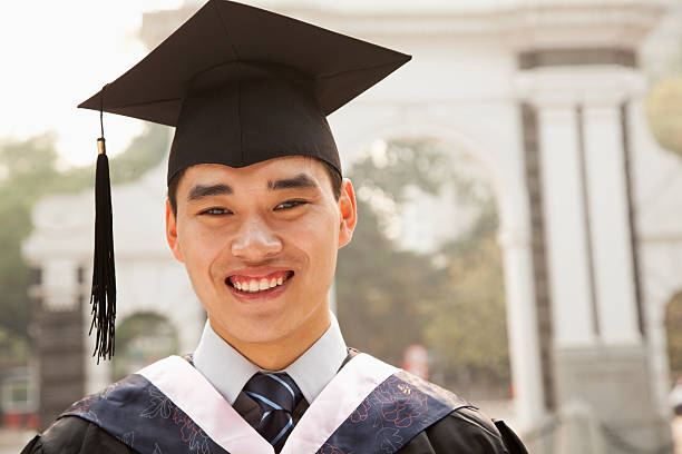 istock Young Graduate in Cap and Gown 453649367
