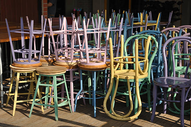 istock Many iron colour chairs keeping by upside down. 453650275
