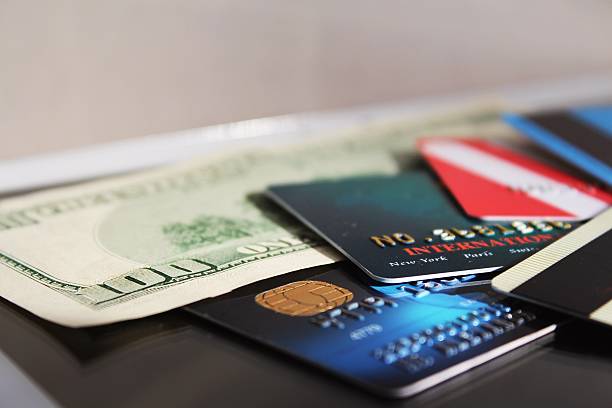 istock Credit cards and banknote (macro) 453651231