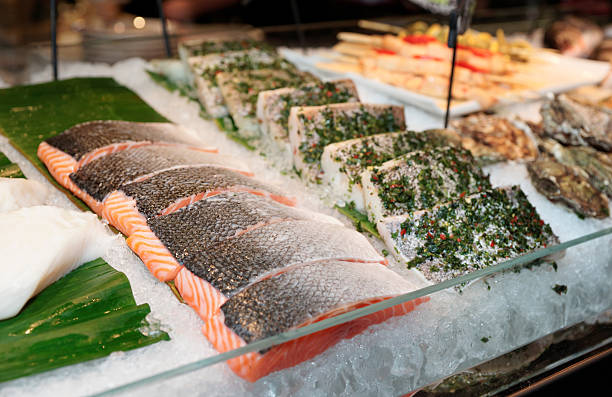Fish steaks on market display Fish steaks on cooled market display fish market photos stock pictures, royalty-free photos & images