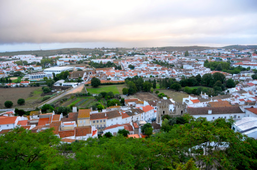 Bird's eye view across upper and lower Estremoz, Portugal with gates and bull ring