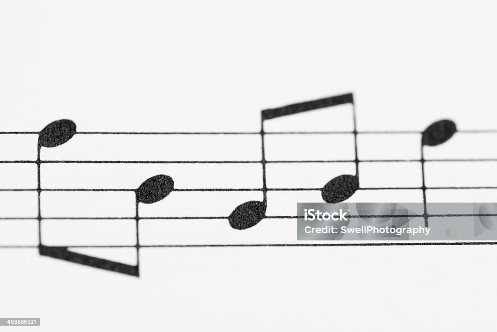 Macro de la hoja de datos de notas de la música. - Foto de stock de Color negro libre de derechos