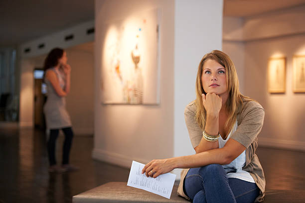istock Pondering the painting's themes 453661871