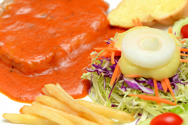 Steak with French fries and vegetable