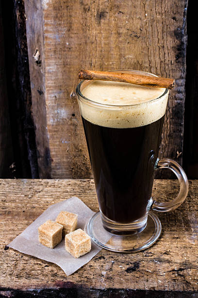 istock High cup of espresso coffee in glass with cinnamon stick 453671995