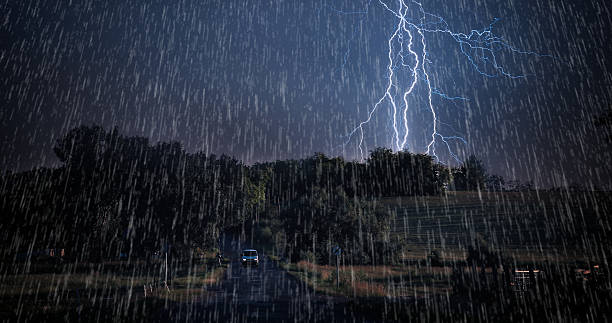 Asphalt road in storm Asphalt road. lightning storm natural disaster cloud stock pictures, royalty-free photos & images