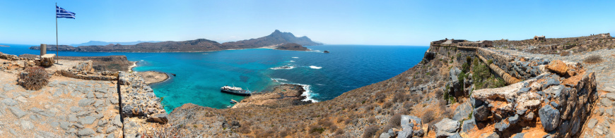 Panorama of Gramvousa , westernmost peninsula of Crete in Greece. Remains of Venetian fort on the top of small isle by Cretan insurgents during Greek War of Independence. Magical turquoise waters, lagoons, beaches of pure white sand.