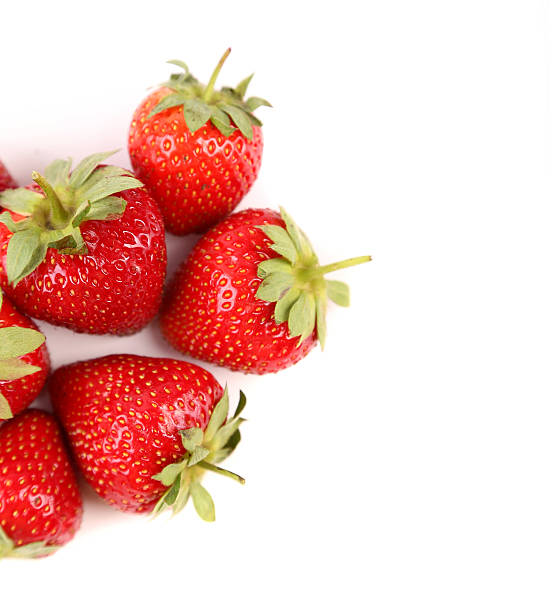 istock Fresh red ripe strawberries isolated on white 453693187
