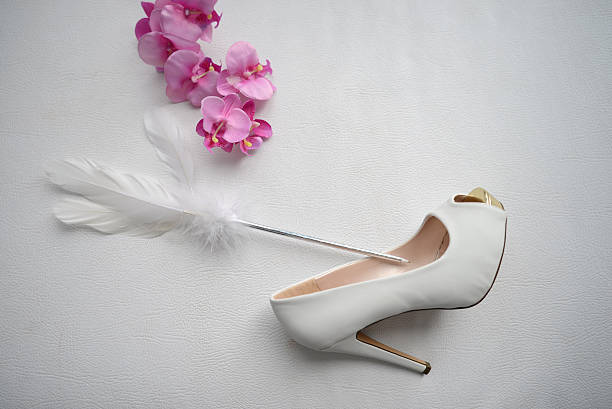 Feet and shoes of an unrecognizable woman, the bride