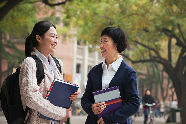 istock University Student and Professor on Campus 453720479