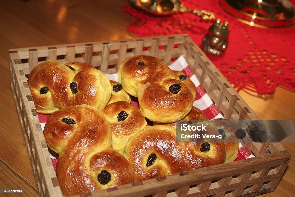 Swedish Lucia buns Lucia buns with saffron and raisins in basket waiting for to be served together with a nice cup of coffee Baked Pastry Item Stock Photo