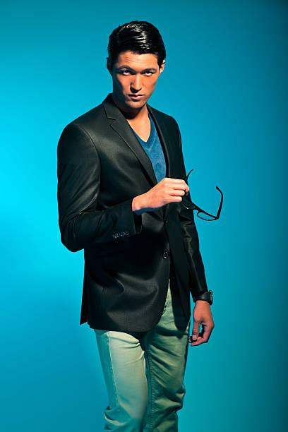 istock Handsome asian man in suit. Summer fashion. Studio shot. 453724061