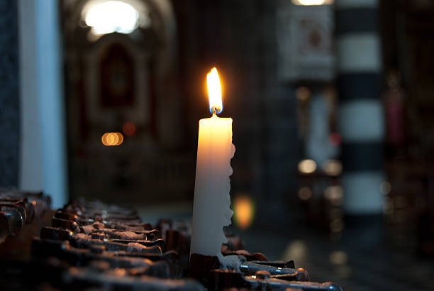 istock Candle in the Church 453728223